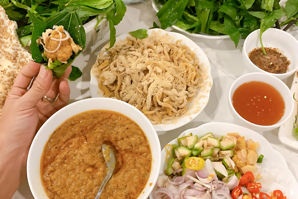 Each roll is wrapped in fig or guava leaves, filled with marinated fish